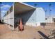 Mobile home with covered patio and fire pit at 2601 E Allred Ave # Br24, Mesa, AZ 85204