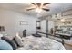 Spacious bedroom with a metal bed frame and mirrored closet doors at 5013 E Mesquite Wood Ct, Phoenix, AZ 85044