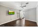 Bright bedroom with hardwood floors and a view of the bathroom at 6120 N 31St Ct, Phoenix, AZ 85016