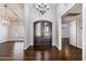 Elegant entryway with double doors and hardwood floors at 6120 N 31St Ct, Phoenix, AZ 85016