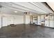 Spacious garage with ample storage shelving and epoxy flooring at 6120 N 31St Ct, Phoenix, AZ 85016