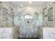 Large walk-in shower with glass enclosure and modern tile work at 6120 N 31St Ct, Phoenix, AZ 85016