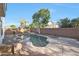 Relaxing kidney-shaped pool with ample surrounding patio space at 16403 W Baden Ave, Goodyear, AZ 85338