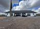 Back of house, showcasing patio and desert landscape at 0 W Pima Rd, Maricopa, AZ 85139