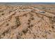 Aerial view of a large desert lot near other properties at 0 W Pima Rd, Maricopa, AZ 85139