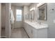 Double vanity bathroom with modern finishes and a shower at 0 W Pima Rd, Maricopa, AZ 85139