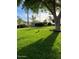 Landscaped front yard with lush green grass at 38507 N 27Th Ave, Phoenix, AZ 85086