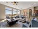 Spacious living room with large windows and open floor plan at 127 E Sabrosa Dr, New River, AZ 85087
