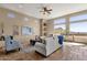 Living room with mountain views and tiled floors at 127 E Sabrosa Dr, New River, AZ 85087