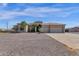Two-story house with three-car garage and gravel driveway at 127 E Sabrosa Dr, New River, AZ 85087