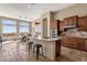 Spacious kitchen with island, stainless steel appliances, and ample cabinetry at 127 E Sabrosa Dr, New River, AZ 85087