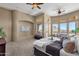 Main bedroom with mountain views and comfortable seating area at 127 E Sabrosa Dr, New River, AZ 85087