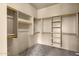 Large walk-in closet with ample shelving and hanging space at 127 E Sabrosa Dr, New River, AZ 85087