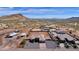 Aerial view showcasing a large lot and two homes with mountain views at 127 E Sabrosa Dr, New River, AZ 85087