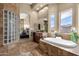 Spa-like Primary bathroom with large soaking tub at 127 E Sabrosa Dr, New River, AZ 85087