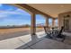 Spacious covered patio with room for seating and enjoying views at 127 E Sabrosa Dr, New River, AZ 85087