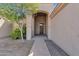 Front entrance with brick pathway and desert landscaping at 127 E Sabrosa Dr, New River, AZ 85087