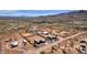 Aerial view of house and surrounding desert landscape at 127 E Sabrosa Dr, New River, AZ 85087