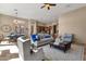 Bright living room featuring comfortable seating and a cozy atmosphere at 127 E Sabrosa Dr, New River, AZ 85087