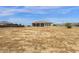 Large, flat backyard with gravel, offering ample space at 127 E Sabrosa Dr, New River, AZ 85087