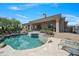 Relaxing kidney-shaped pool with spacious patio area at 26601 N Aguila Rd, Rio Verde, AZ 85263