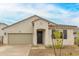 Charming one-story home with a two-car garage at 17860 W Villa Hermosa Ln, Surprise, AZ 85387