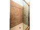 Shower with glass enclosure and tiled walls at 8563 E Tumbleweed Dr, Scottsdale, AZ 85266