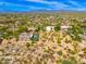 Aerial perspective of a home with pool and desert landscape at 8563 E Tumbleweed Dr, Scottsdale, AZ 85266