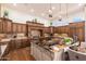 Large kitchen with granite countertops and custom wood cabinetry at 8563 E Tumbleweed Dr, Scottsdale, AZ 85266