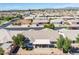 Aerial view of the house and surrounding neighborhood, showcasing the location and landscape at 8217 E Natal Ave, Mesa, AZ 85209
