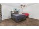 Spacious bedroom with carpeted floor and built-in drawers at 6565 N 19Th Ave # 21, Phoenix, AZ 85015