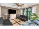 Cozy living room with comfortable seating and a large TV at 6565 N 19Th Ave # 21, Phoenix, AZ 85015