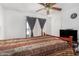 Bedroom with a double bed, TV, and sliding glass door at 6565 N 19Th Ave # 21, Phoenix, AZ 85015