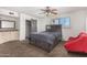 Bedroom with a queen bed, dresser, and ceiling fan at 6565 N 19Th Ave # 21, Phoenix, AZ 85015