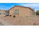 Tan single-story home with landscaping at 437 E Germann Rd # 146, San Tan Valley, AZ 85140
