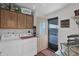 Laundry room with washer, dryer, and exterior access at 437 E Germann Rd # 146, San Tan Valley, AZ 85140