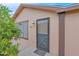 House exterior with a dark gray front door and landscaping at 437 E Germann Rd # 146, San Tan Valley, AZ 85140
