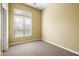 Well-lit bedroom featuring carpeted floors at 40040 N Lytham Way, Anthem, AZ 85086