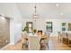 Dining room with wood table and chairs, fireplace at 8513 E Belgian Trl, Scottsdale, AZ 85258