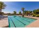 Refreshing community lap pool with lounge chairs at 1451 E Palm Beach Dr, Chandler, AZ 85249