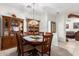 Bright dining room featuring a wood table and chairs, with built-in hutch at 1451 E Palm Beach Dr, Chandler, AZ 85249