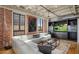 Spacious living room with sectional sofa and large TV at 114 W Adams St # 808, Phoenix, AZ 85003