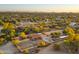 Aerial view of property showing house and stables at 6348 E Wildcat Dr, Cave Creek, AZ 85331