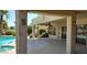 Covered patio overlooking the pool at 13302 W Serenade Cir, Sun City West, AZ 85375