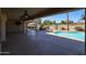 Inviting pool area with patio and lush landscaping at 13302 W Serenade Cir, Sun City West, AZ 85375