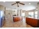 Spacious kitchen with granite counters, stainless steel appliances, and ample cabinet space at 13302 W Serenade Cir, Sun City West, AZ 85375