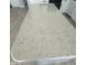 Close-up view of the kitchen island's beautiful light grey quartz countertop at 20411 N 99Th Dr, Peoria, AZ 85382
