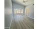 Large living room with vaulted ceilings and neutral color palette at 20411 N 99Th Dr, Peoria, AZ 85382