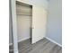 Bedroom closet with sliding doors and shelving at 20411 N 99Th Dr, Peoria, AZ 85382