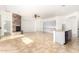 Living room with stone fireplace and kitchen views at 34218 N 26Th Ave, Phoenix, AZ 85085